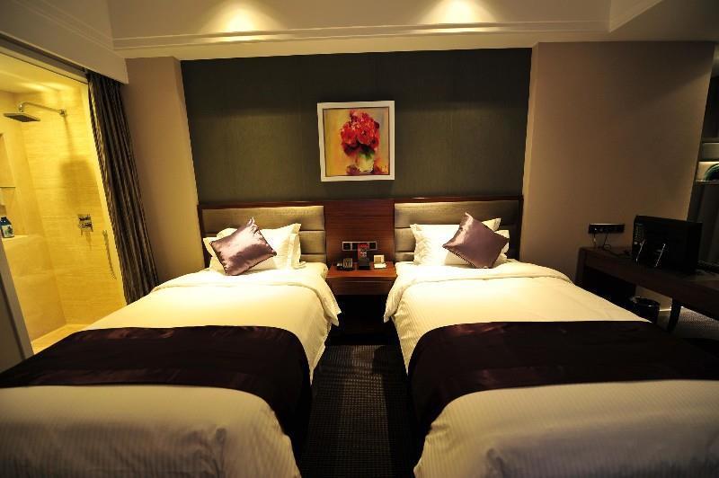 Shanghai New Century Manju Hotel Luoshan @Sniec Habitación foto